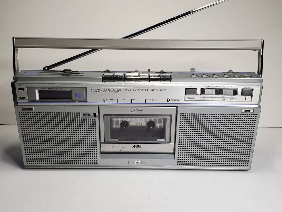 a vintage JVC boombox with cassette player, silver.