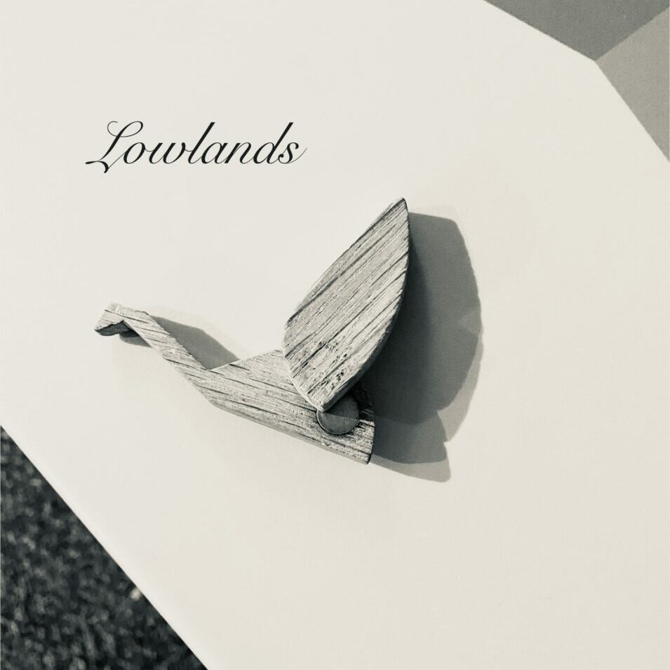 An origami-style bird on a beige background, with the caption "Lowlands" in script