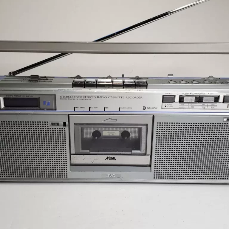 a vintage JVC boombox with cassette player, silver.